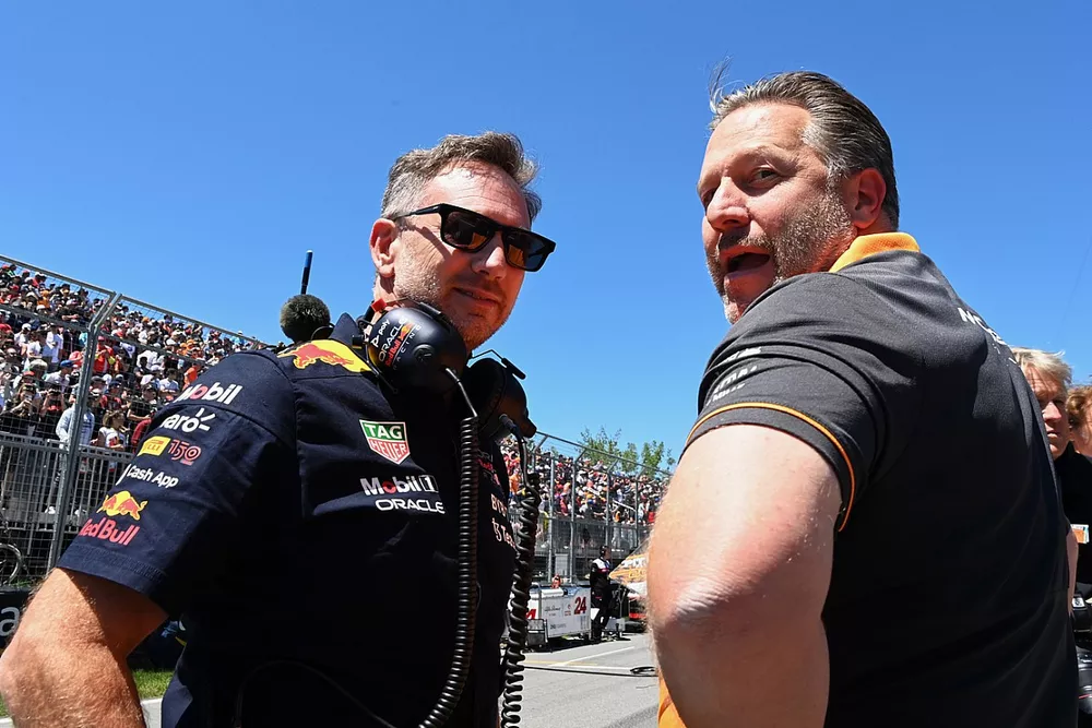 Christian Horner, Team Principal, Red Bull Racing, Zak Brown, CEO, McLaren Racing, on the grid