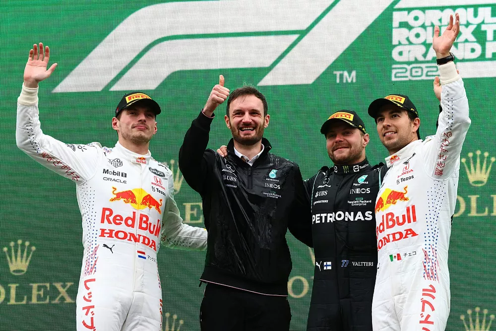 Max Verstappen, Red Bull Racing, 2nd position, the Mercedes trophy delegate, Valtteri Bottas, Mercedes, 1st position, and Sergio Perez, Red Bull Racing, 3rd position, on the podium