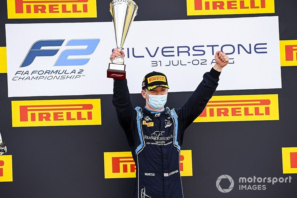 Race Winner Dan Ticktum, Dams celebrates on the podium with the trophy