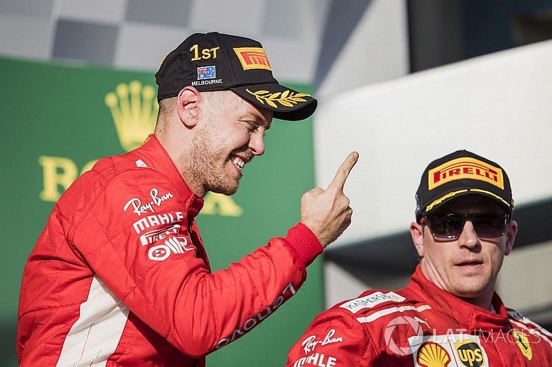 Sebastian Vettel, Ferrari, con Kimi Raikkonen, Ferrari