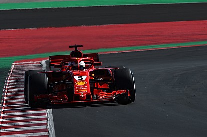 Vettel stays top amid more McLaren problems