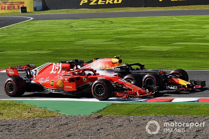 Kimi Raikkonen, Ferrari SF71H and Max Verstappen, Red Bull Racing RB14