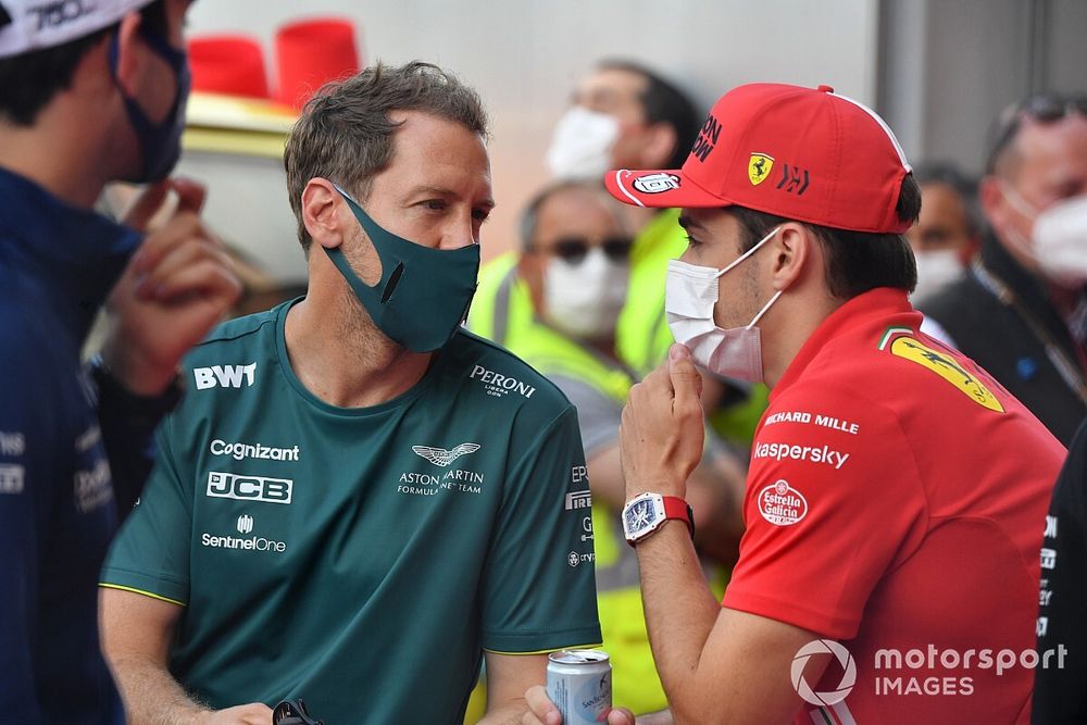 Sebastian Vettel, Aston Martin, and Charles Leclerc, Ferrari, in the drivers parade