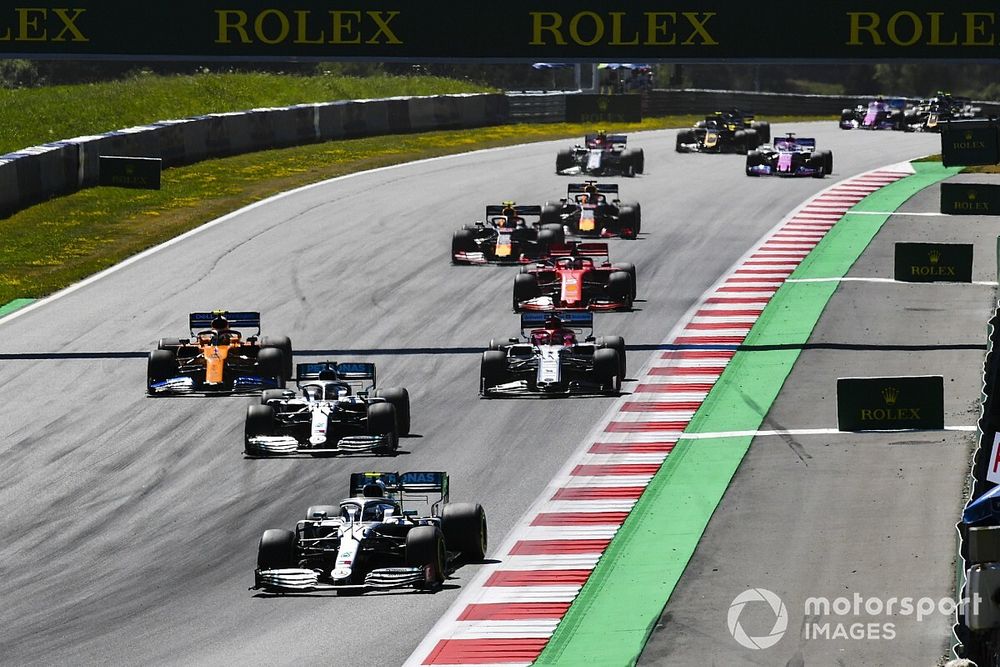 Valtteri Bottas, Mercedes AMG W10, leads Lewis Hamilton, Mercedes AMG F1 W10, Lando Norris, McLaren MCL34, Kimi Raikkonen, Alfa Romeo Racing C38, Sebastian Vettel, Ferrari SF90, Max Verstappen, Red Bull Racing RB15, Pierre Gasly, Red Bull Racing RB15, and the remainder of the field at the start