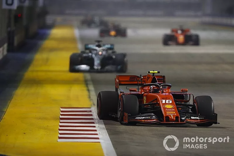 Charles Leclerc, Ferrari SF90, leads Lewis Hamilton, Mercedes AMG F1 W10