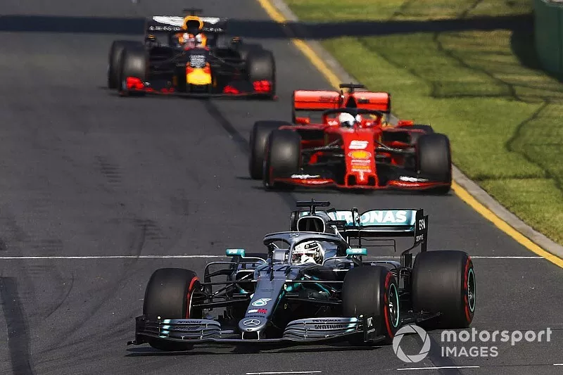 Lewis Hamilton, Mercedes AMG F1 W10, leads Sebastian Vettel, Ferrari SF90, and Max Verstappen, Red Bull Racing RB15