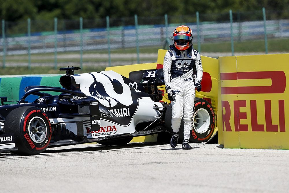 Yuki Tsunoda, AlphaTauri, walks away from his car after spinning out in practice