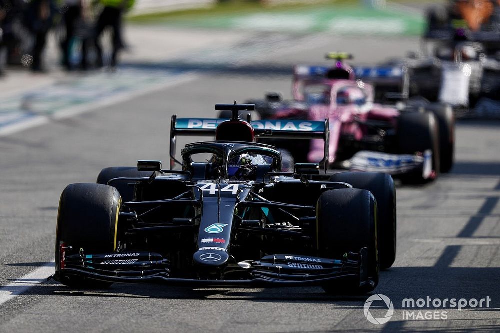 Lewis Hamilton, Mercedes F1 W11 Lance Stroll, Racing Point RP20 in the pit lane