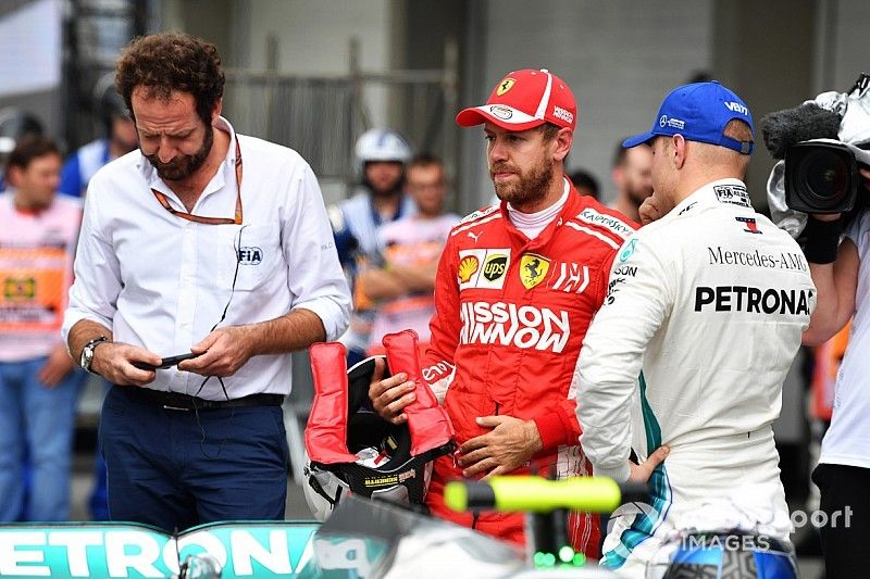 Vettel sufre reprimenda y multa tras la calificación en Brasil