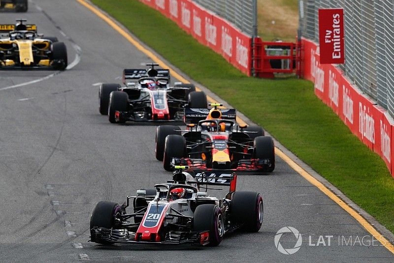 Kevin Magnussen, Haas F1 Team VF-18 Ferrari, leads Max Verstappen, Red Bull Racing RB14 Tag Heuer, Romain Grosjean, Haas F1 Team VF-18 Ferrari, and Nico Hulkenberg, Renault Sport F1 Team R.S. 18