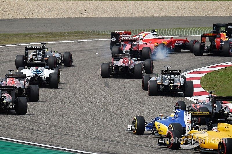 Vettel and Kvyat at odds over first-lap incident