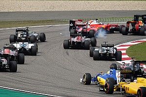 Vettel and Kvyat at odds over first-lap incident