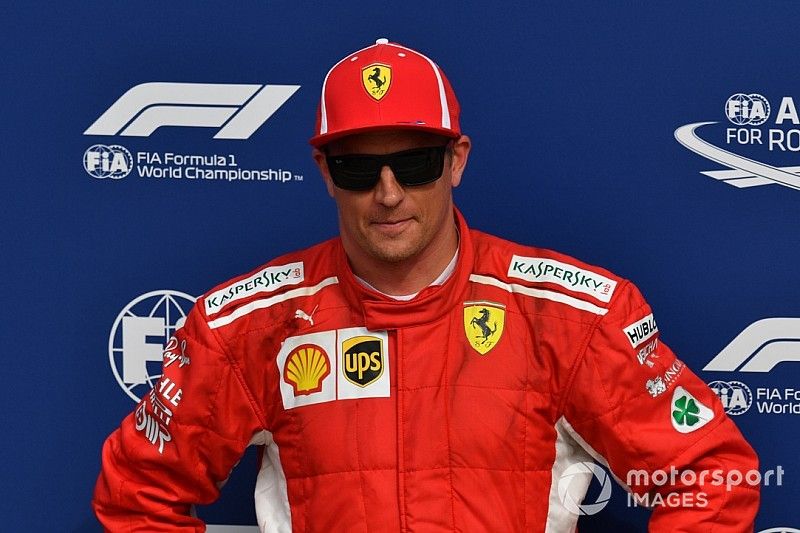 Pole sitter Kimi Raikkonen, Ferrari in parc ferme 