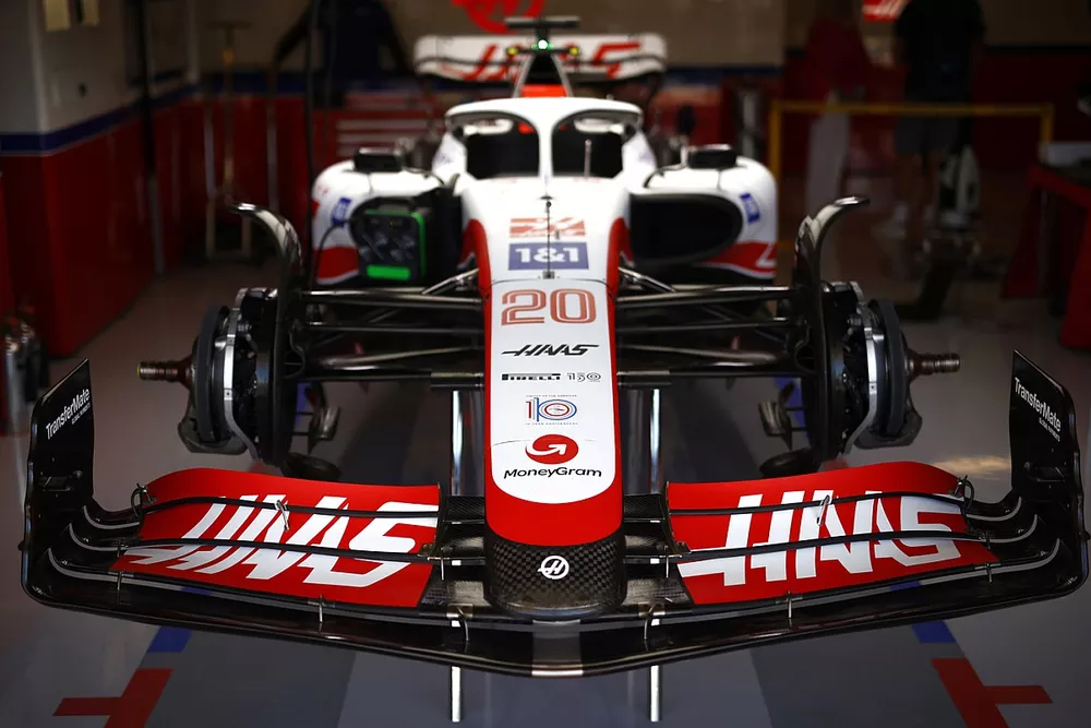 Haas VF-22, in garage, moneygram detail