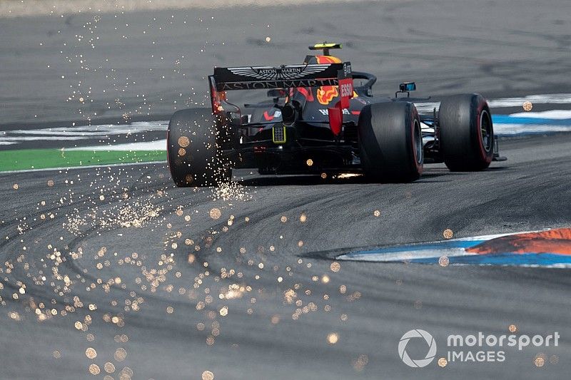 Sparks fly from the car of Pierre Gasly, Red Bull Racing RB15