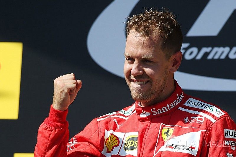 Podio: ganador de la carrera Sebastian Vettel, Ferrari
