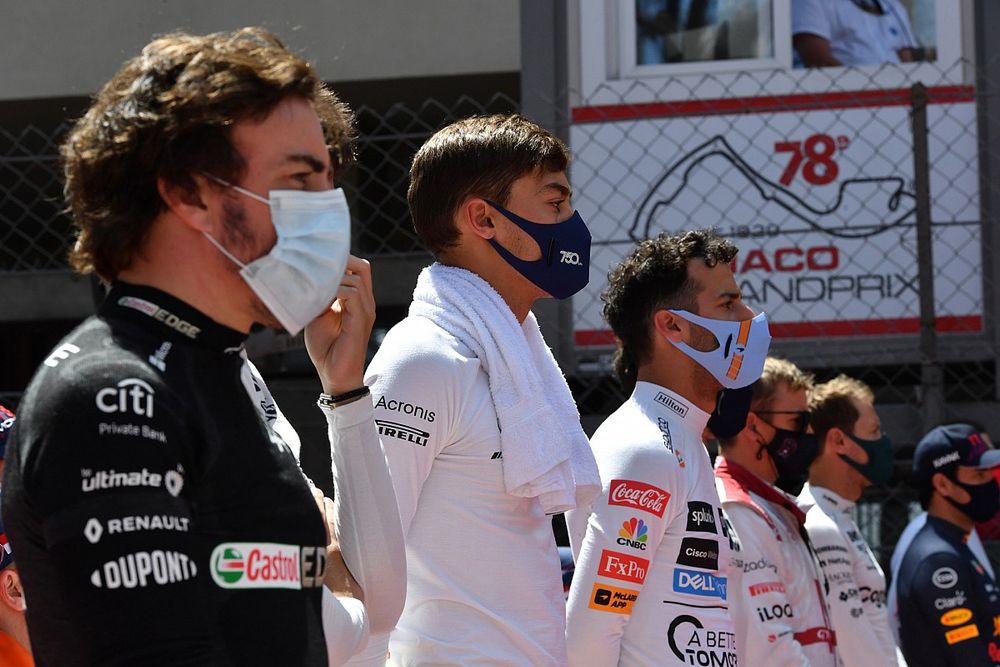 Fernando Alonso, Alpine F1, George Russell, Williams, and Daniel Ricciardo, McLaren, on the grid