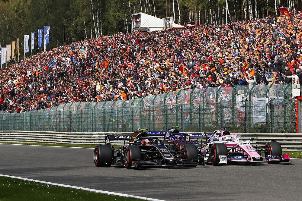 Sergio Perez, Racing Point RP19, leads Kevin Magnussen, Haas F1 Team VF-19 and Pierre Gasly, Toro Rosso STR14 