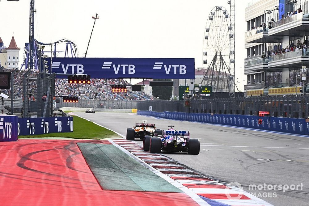 Carlos Sainz Jr., McLaren MCL35, Sergio Perez, Racing Point RP20