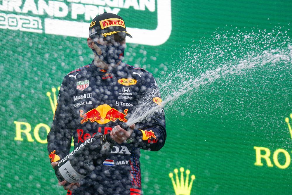 Max Verstappen, Red Bull Racing, 1st position, sprays Champagne on the podium