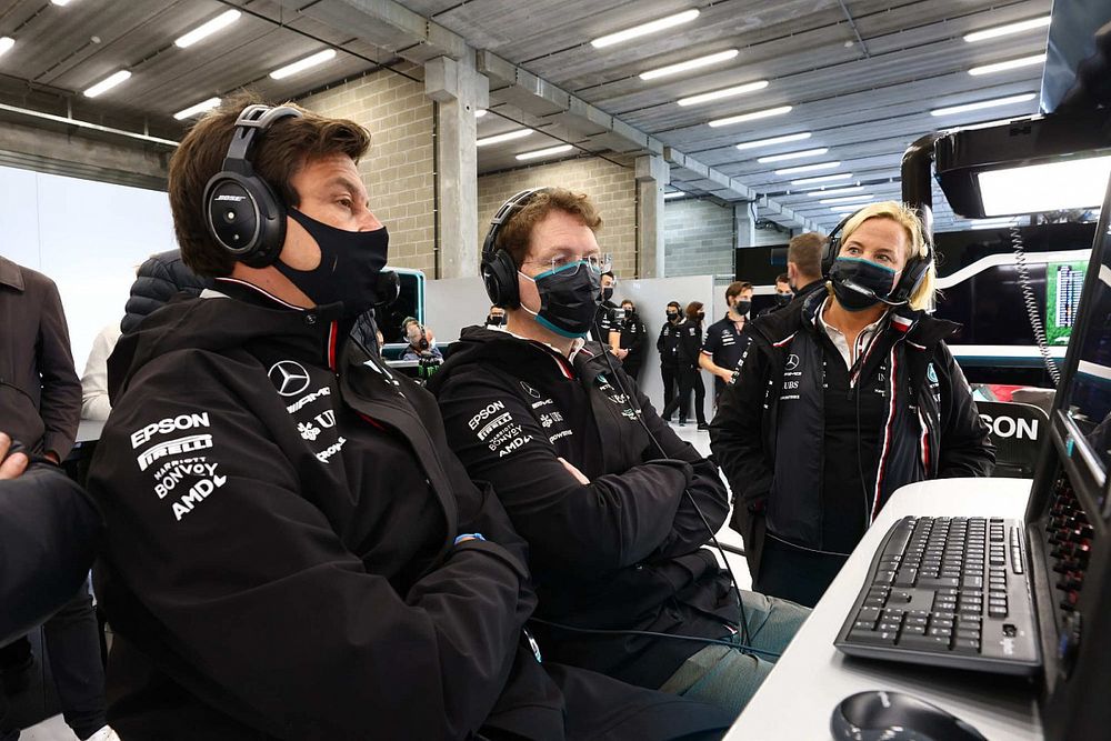 Toto Wolff, Team Principal and CEO, Mercedes AMG, in the garage with team mates