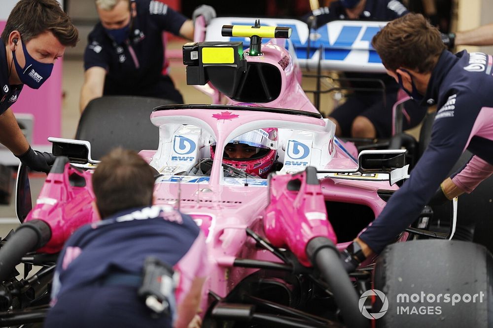 Lance Stroll, Racing Point RP20, is returned to the garage