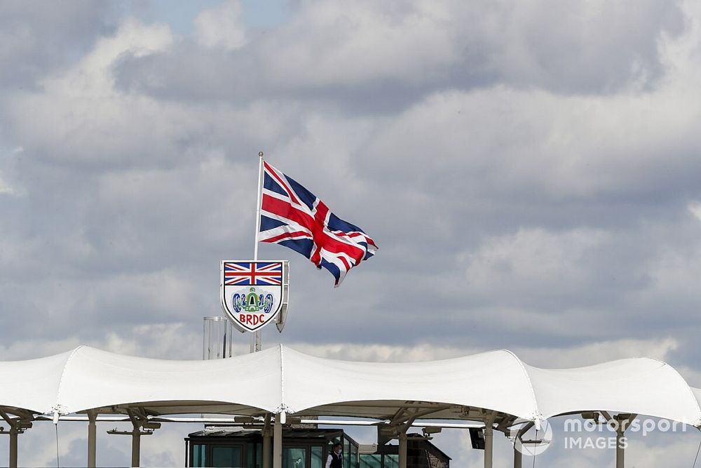 The Union flag flies over the BRDC club house