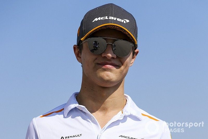 Lando Norris, McLaren walks the track 