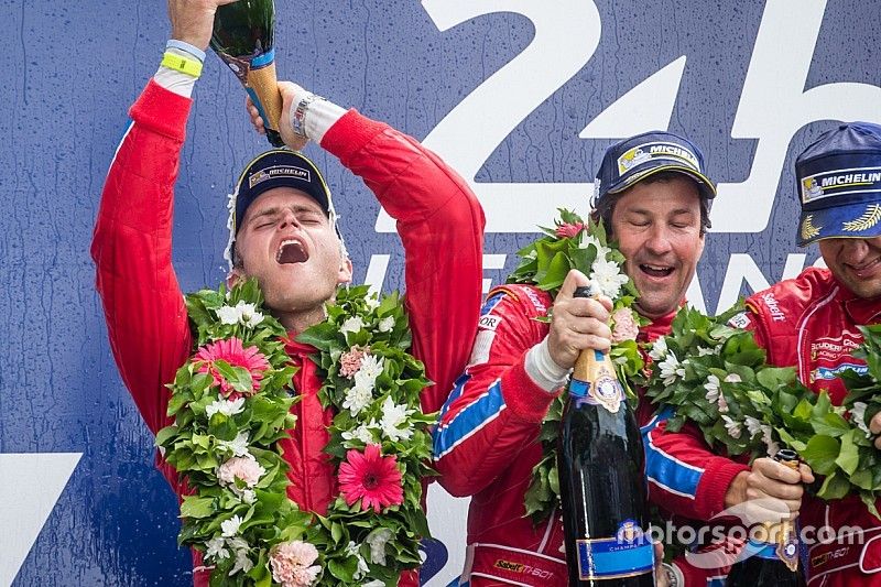 LMGT Am podium: class winners #62 Scuderia Corsa Ferrari 458 Italia: Bill Sweedler, Jeff Segal, Townsend Bell