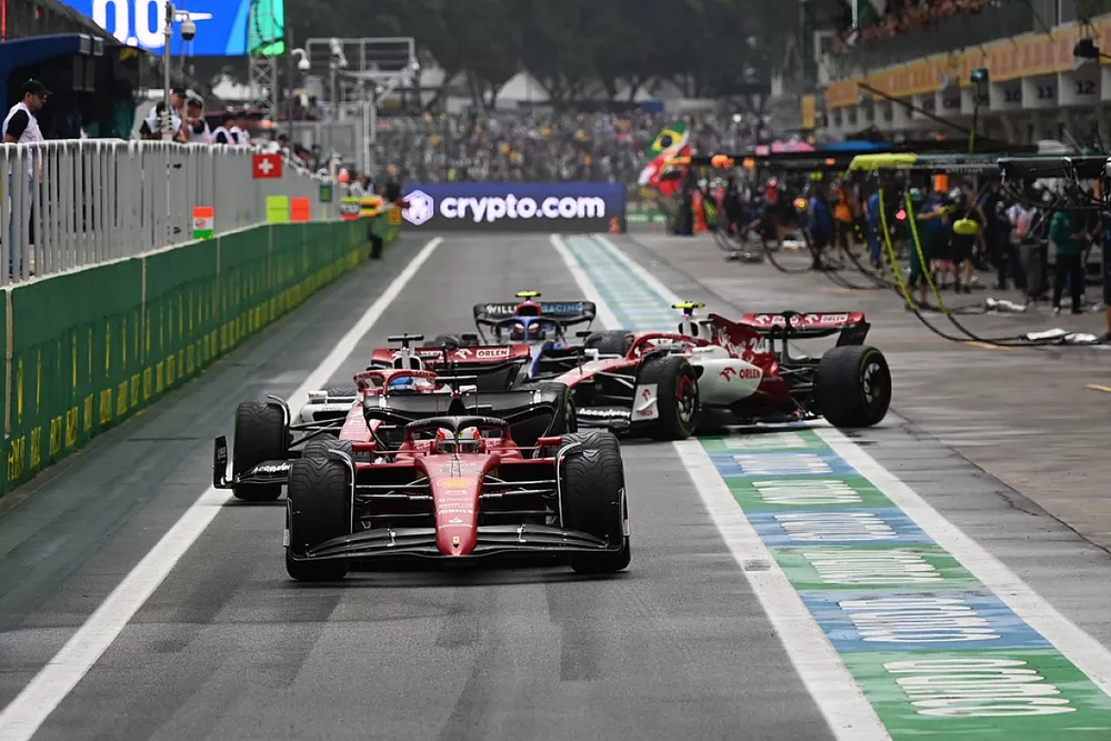 Charles Leclerc, Ferrari F1-75, Valtteri Bottas, Alfa Romeo C42, Zhou Guanyu, Alfa Romeo C42, out of the pits