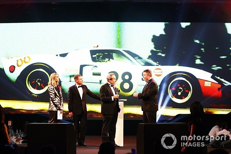 Jacky Ickx receives a Gregor Grant Award on stage