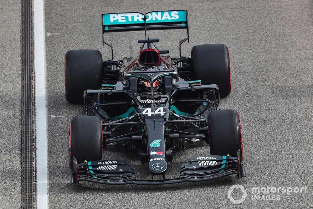 Lewis Hamilton, Mercedes F1 W11, heads to the grid