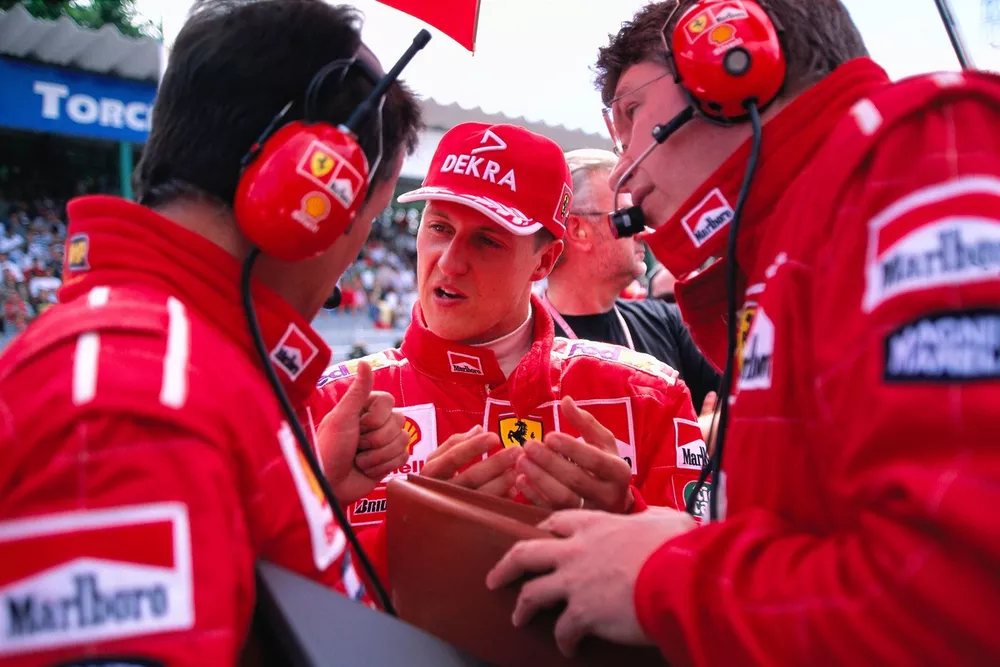Michael Schumacher, Ferrari with Francesco Barletta and Ross Brawn