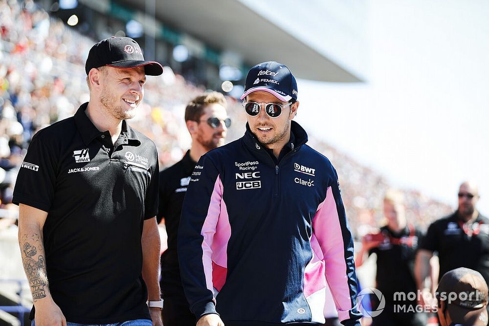 Kevin Magnussen, Haas F1, and Sergio Perez, Racing Point, in the drivers parade