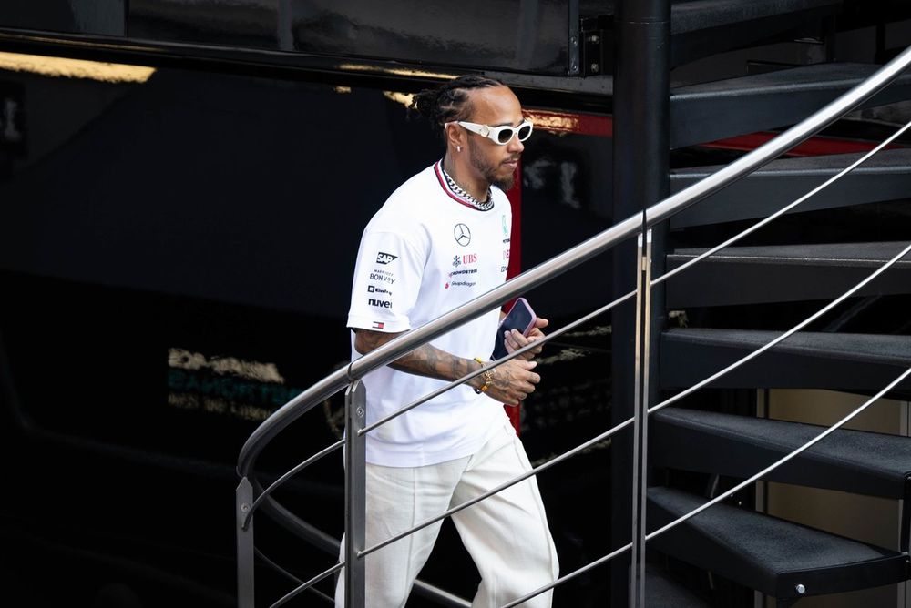 Lewis Hamilton, Mercedes-AMG F1 Team, walks up the stairs of the Mercedes AMG hospitality unit