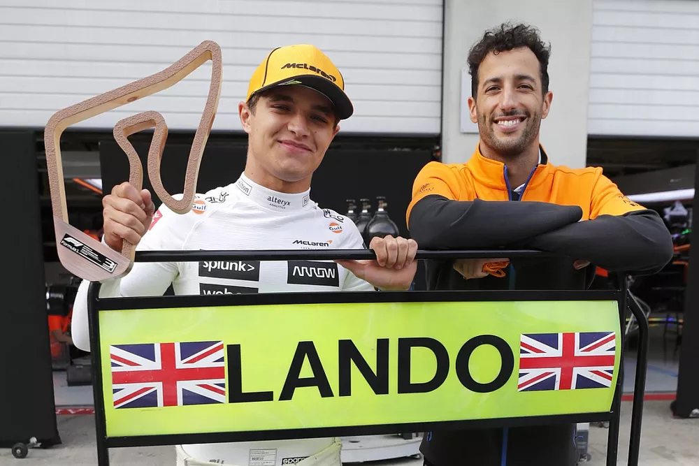 Lando Norris, McLaren, 3rd position, and Daniel Ricciardo, McLaren , celebrate with the McLaren team after the race