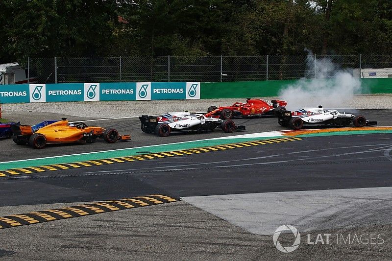 Sebastian Vettel, Ferrari SF71H spins after contact with Lewis Hamilton, Mercedes AMG F1 W09 on lap one 