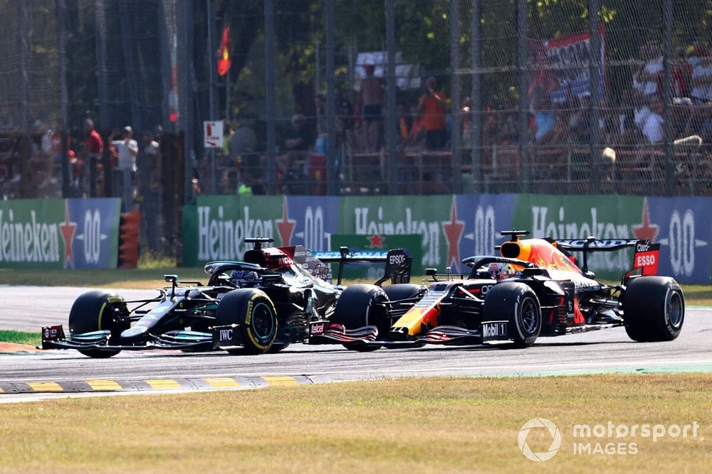 Lewis Hamilton, Mercedes W12, battles with Max Verstappen, Red Bull Racing RB16B