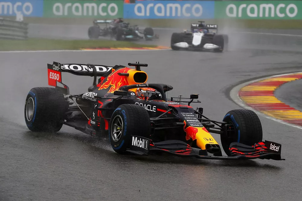 Max Verstappen, Red Bull Racing RB16B, George Russell, Williams FW43B, and Lewis Hamilton, Mercedes W12