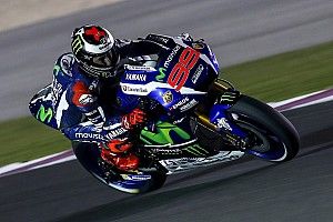 Rossi falls as Lorenzo sets hot pace on opening day of Qatar test