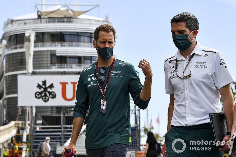 Sebastian Vettel, Aston Martin, walks the track with team mates