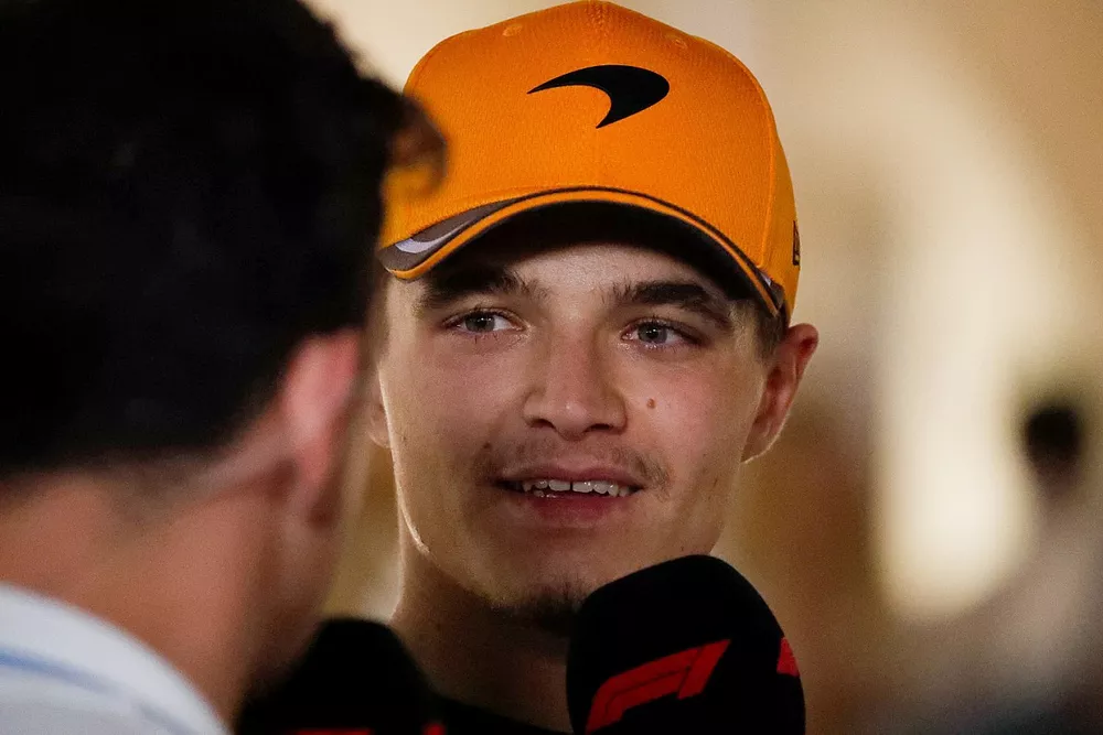 Lando Norris, McLaren, talks to the media