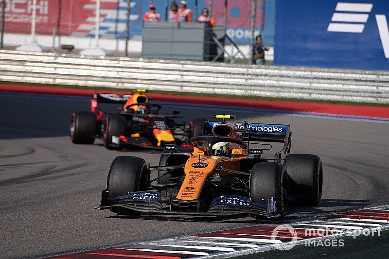 Lando Norris, McLaren MCL34, leads Alex Albon, Red Bull Racing RB15