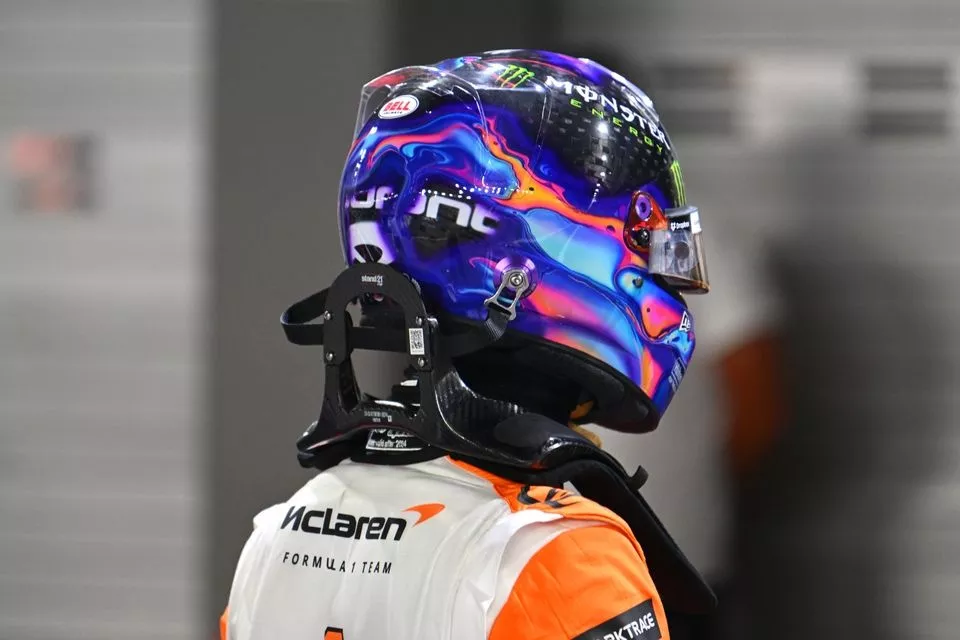Pole man Lando Norris, McLaren F1 Team, arrives in Parc Ferme