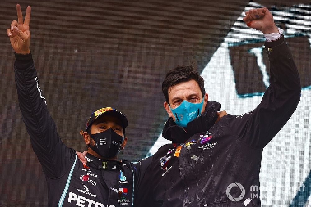 Lewis Hamilton, Mercedes-AMG F1, 1st position, and Toto Wolff, Executive Director (Business), Mercedes AMG, celebrate on the podium