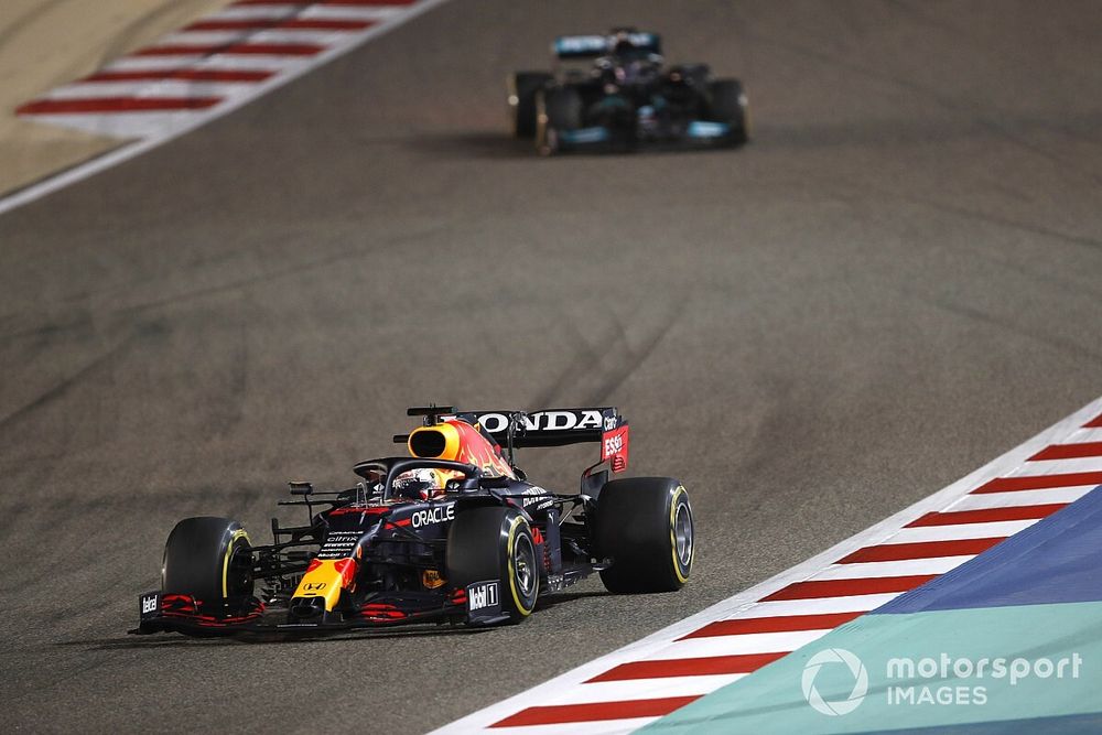 Max Verstappen, Red Bull Racing RB16B and Lewis Hamilton, Mercedes W12 