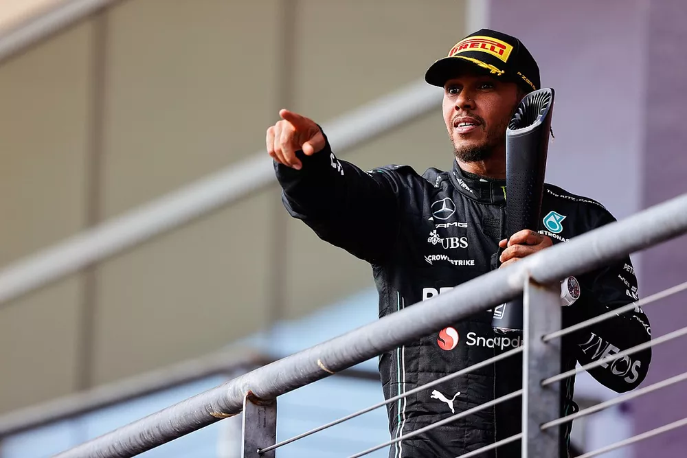 Lewis Hamilton, Mercedes-AMG, 2nd position, on the podium with his trophy