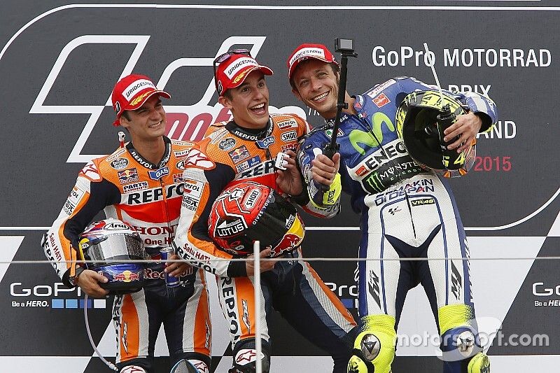 Podium: segundo, Dani Pedrosa y el ganador, Marc Márquez, Repsol Honda Team y el tercero, Valentino 