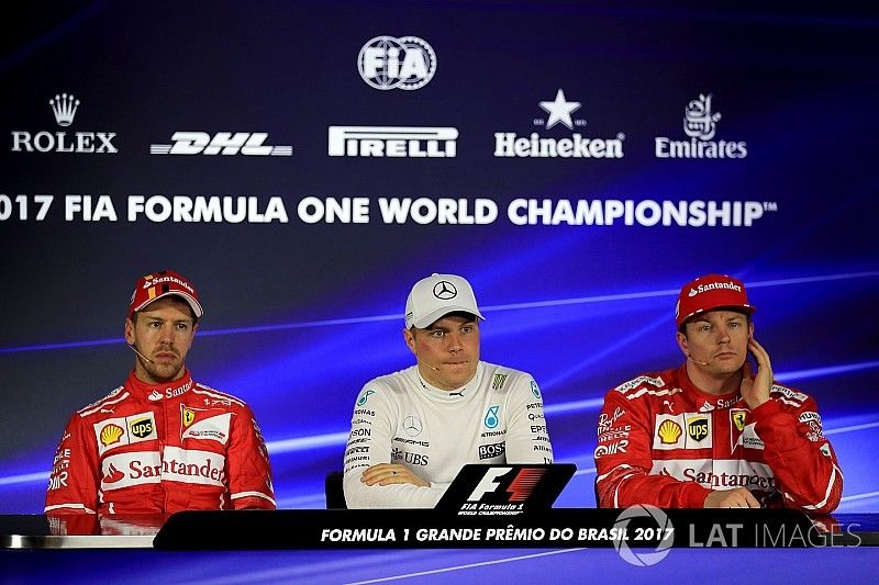 Sebastian Vettel, Ferrari, le poleman Valtteri Bottas, Mercedes AMG F1 et Kimi Raikkonen, Ferrari en conférence de presse