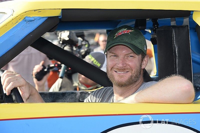 Dale Earnhardt Jr. with Dale Earnhardt's rookie car